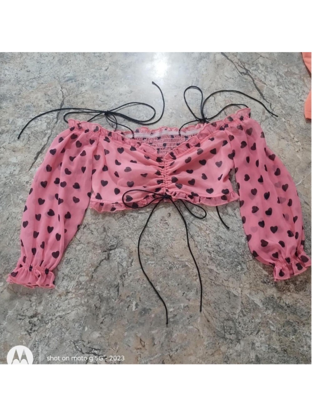 Pink heart crop top with black hearts and bow detail